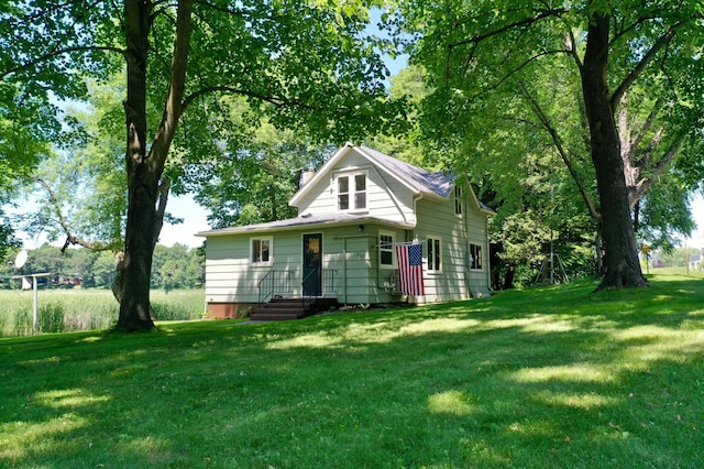 33027 County Road 50, Avon Twp, MN 56310 - bungalow-style house with a front yard and a chimney