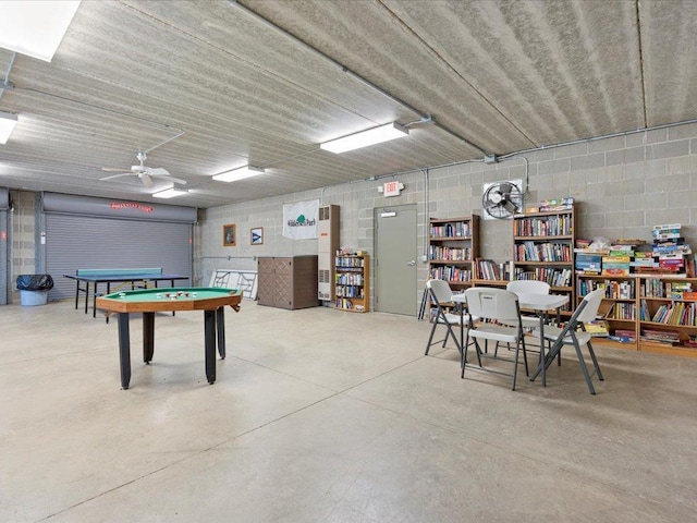 15827 Wilderness Trl Unit 30, Crosslake, MN 56442 - game room featuring billiards table, concrete floors, concrete block wall, and ceiling fan