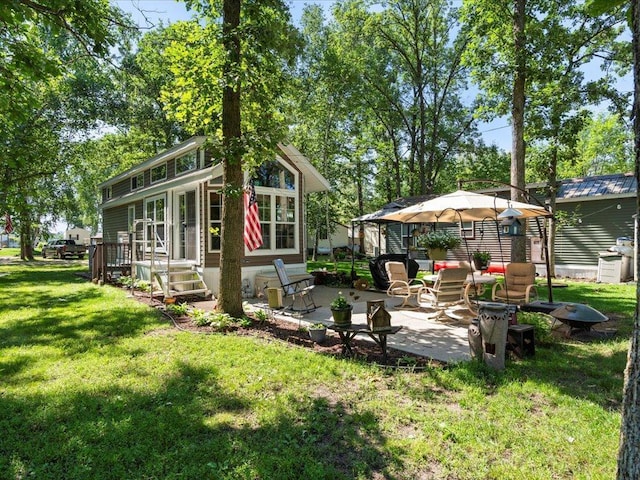 15827 Wilderness Trl Unit 112, Crosslake, MN 56442 - back of property with a patio area and a lawn