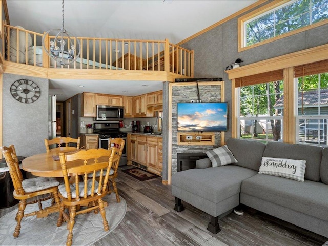 15827 Wilderness Trl Unit 112, Crosslake, MN 56442 - dining room featuring dark wood-type flooring and a towering ceiling