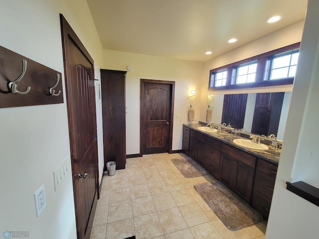 11003 Eagles Nest Ct, Audubon, MN 56511 - bathroom featuring double vanity, recessed lighting, and tile patterned floors