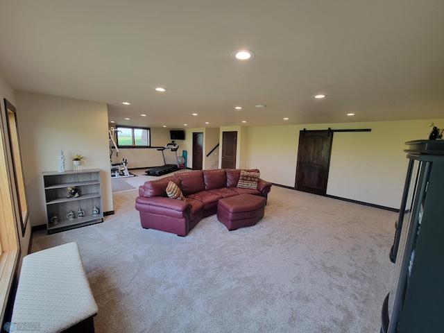 11003 Eagles Nest Ct, Audubon, MN 56511 - living area with a barn door, recessed lighting, light colored carpet, and stairs