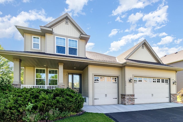 6274 Zircon Ln N, Maple Grove, MN 55311 - craftsman-style house with board and batten siding, driveway, a garage, covered porch, and a shingled roof
