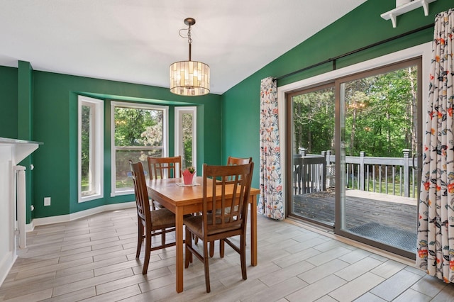 990 221st Ave NW, Oak Grove, MN 55011 - dining space with a chandelier and wood finished floors