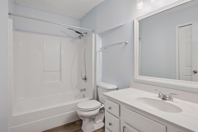 990 221st Ave NW, Oak Grove, MN 55011 - full bath with vanity, tub / shower combination, wood finished floors, and a textured ceiling