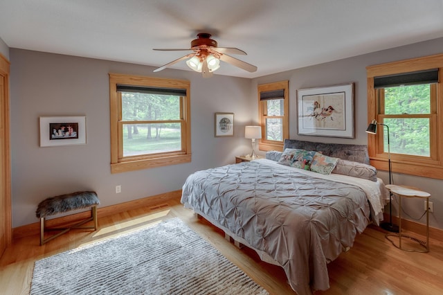 31767 Deacons Way, Pequot Lakes, MN 56472 - bedroom featuring wood finished floors and a ceiling fan