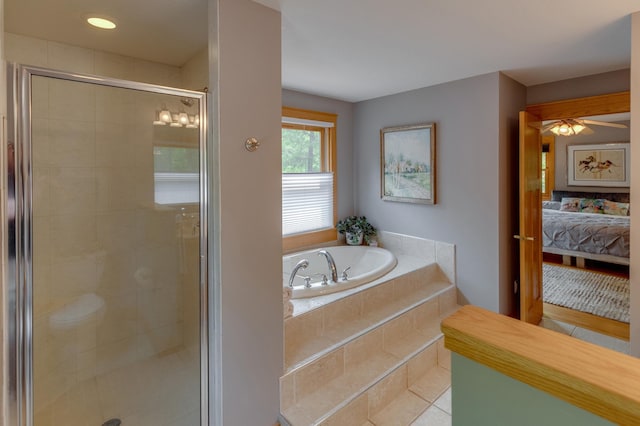 31767 Deacons Way, Pequot Lakes, MN 56472 - bathroom with a garden tub, a stall shower, ensuite bath, tile patterned floors, and ceiling fan