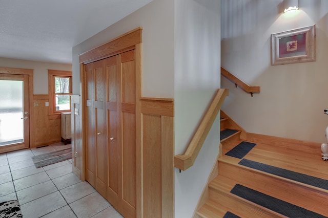 31767 Deacons Way, Pequot Lakes, MN 56472 - stairs featuring a wainscoted wall and tile patterned flooring