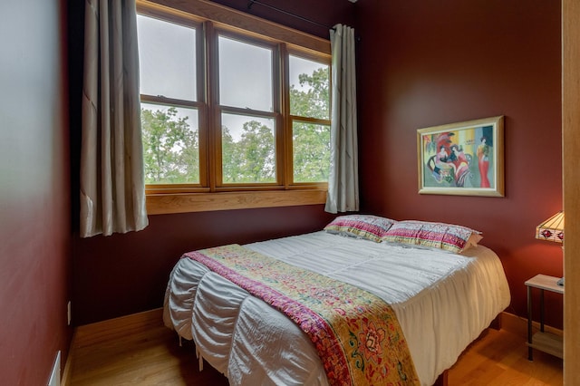 31767 Deacons Way, Pequot Lakes, MN 56472 - bedroom with wood finished floors