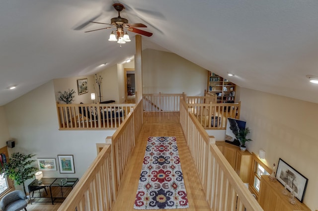 31767 Deacons Way, Pequot Lakes, MN 56472 - corridor featuring an upstairs landing, vaulted ceiling, and light wood finished floors