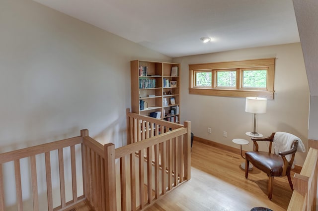 31767 Deacons Way, Pequot Lakes, MN 56472 - sitting room with an upstairs landing and wood finished floors