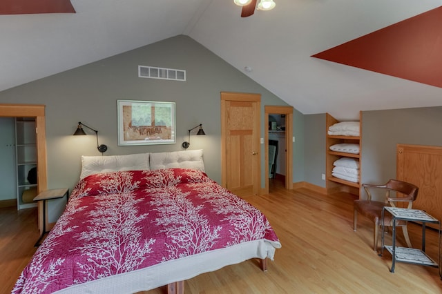 31767 Deacons Way, Pequot Lakes, MN 56472 - bedroom featuring lofted ceiling, wood finished floors, and ceiling fan