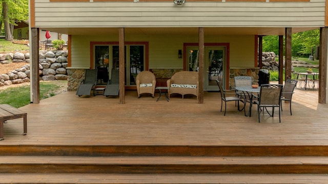 31767 Deacons Way, Pequot Lakes, MN 56472 - wooden terrace with outdoor dining area