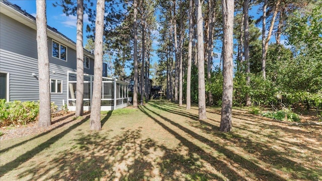 814 8th Ave N, Sartell, MN 56377 - view of green lawn featuring a sunroom