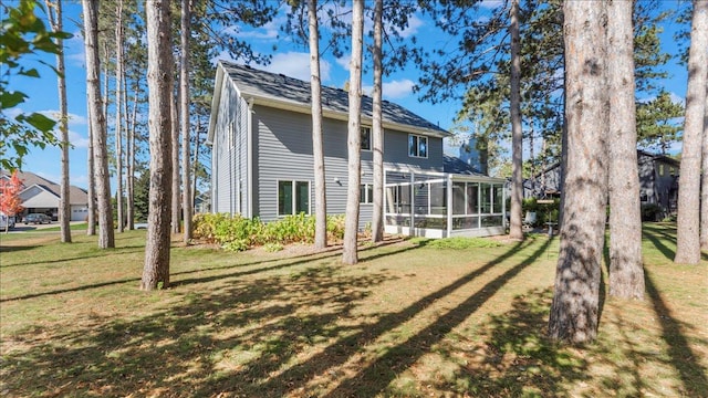 814 8th Ave N, Sartell, MN 56377 - back of house featuring a sunroom and a yard
