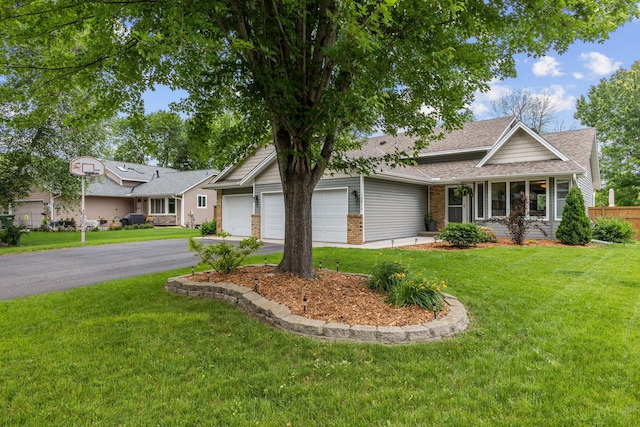 12816 95th Ave N, Maple Grove, MN 55369 - ranch-style house featuring a garage, asphalt driveway, brick siding, and a shingled roof