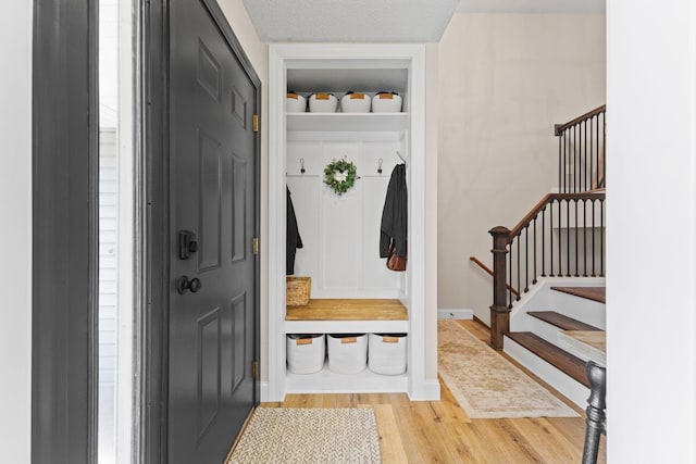 12816 95th Ave N, Maple Grove, MN 55369 - mudroom featuring wood finished floors and baseboards