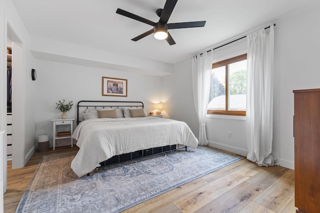 12816 95th Ave N, Maple Grove, MN 55369 - bedroom with wood finished floors and ceiling fan