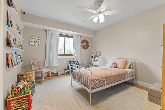 12816 95th Ave N, Maple Grove, MN 55369 - bedroom featuring a ceiling fan and wood finished floors
