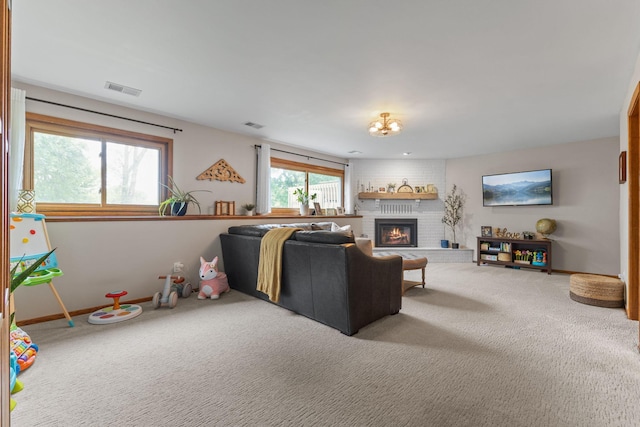 12816 95th Ave N, Maple Grove, MN 55369 - living area featuring carpet and a fireplace