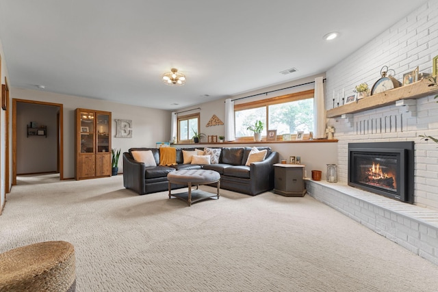 12816 95th Ave N, Maple Grove, MN 55369 - living area with carpet and a fireplace