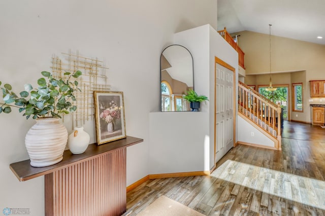 4375 58th St S, Fargo, ND 58104 - entrance foyer with stairs, wood finished floors, and high vaulted ceiling