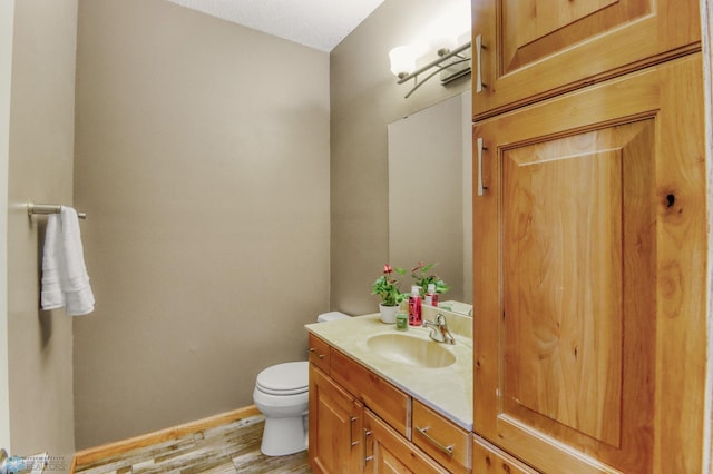 4375 58th St S, Fargo, ND 58104 - bathroom featuring vanity and wood finished floors
