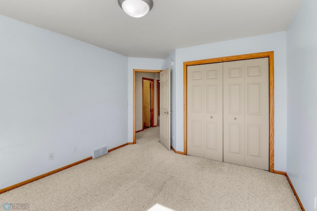 4375 58th St S, Fargo, ND 58104 - unfurnished bedroom featuring carpet and a closet