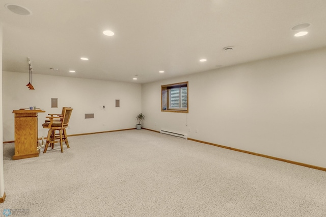 4375 58th St S, Fargo, ND 58104 - finished basement featuring a baseboard heating unit, a dry bar, and recessed lighting