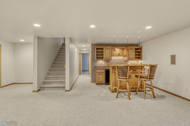 4375 58th St S, Fargo, ND 58104 - indoor bar featuring light carpet, stairway, and recessed lighting