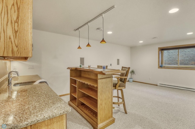 4375 58th St S, Fargo, ND 58104 - kitchen featuring light colored carpet, a breakfast bar, a baseboard radiator, open shelves, and recessed lighting