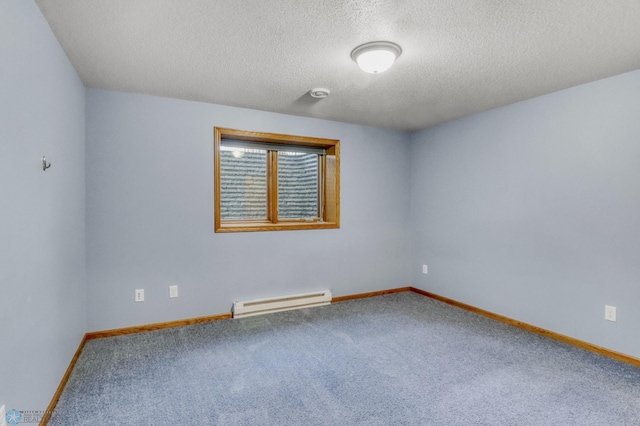4375 58th St S, Fargo, ND 58104 - unfurnished room with a baseboard heating unit, a textured ceiling, and carpet flooring