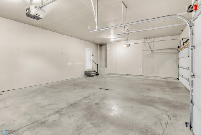 4375 58th St S, Fargo, ND 58104 - garage featuring a garage door opener