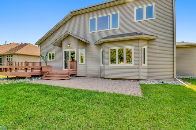 4375 58th St S, Fargo, ND 58104 - back of house with a wooden deck, a yard, and a patio