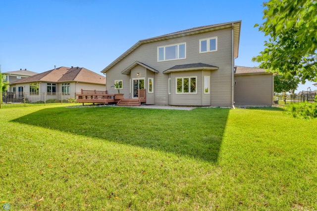 4375 58th St S, Fargo, ND 58104 - rear view of property with a deck and a patio