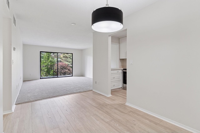 4100 Parklawn Ave Unit 118, Edina, MN 55435 - empty room featuring light wood-style floors and baseboards
