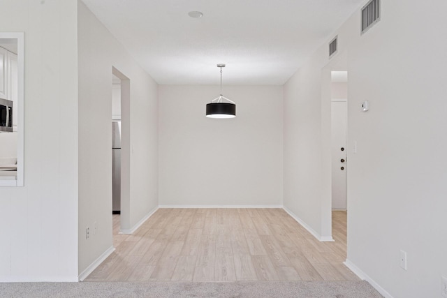 4100 Parklawn Ave Unit 118, Edina, MN 55435 - empty room featuring wood finished floors and baseboards