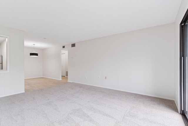 4100 Parklawn Ave Unit 118, Edina, MN 55435 - empty room featuring light carpet and baseboards