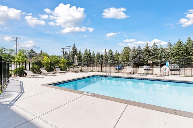 4100 Parklawn Ave Unit 118, Edina, MN 55435 - community pool featuring a patio and view of scattered trees