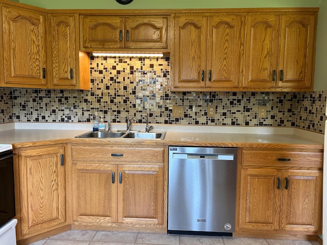 402 6th St NE, Barnesville, MN 56514 - kitchen featuring dishwasher, light countertops, brown cabinets, and tasteful backsplash