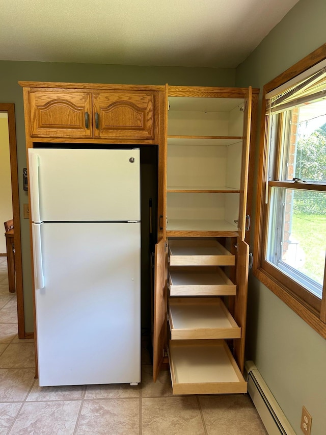 402 6th St NE, Barnesville, MN 56514 - storage area with a baseboard heating unit