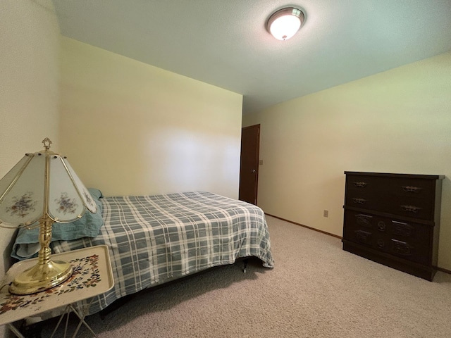 402 6th St NE, Barnesville, MN 56514 - bedroom with carpet and baseboards