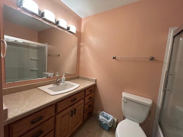 402 6th St NE, Barnesville, MN 56514 - bathroom featuring an enclosed shower, vanity, and tile patterned floors