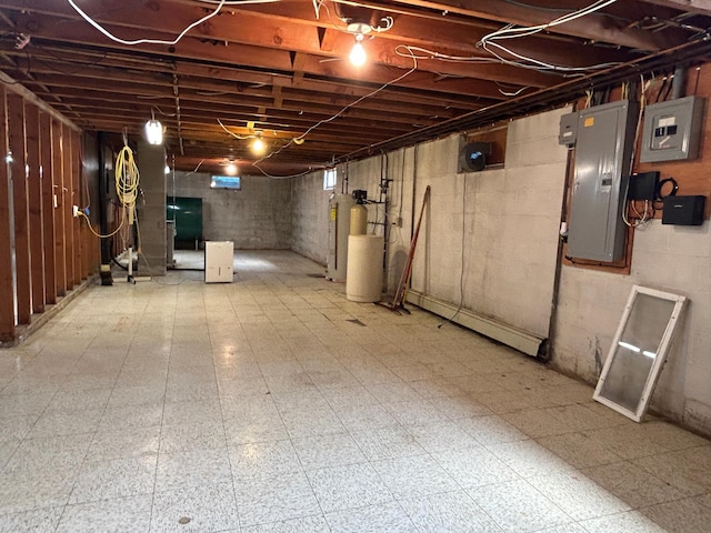 402 6th St NE, Barnesville, MN 56514 - unfinished basement featuring tile patterned floors, electric panel, and a water softener