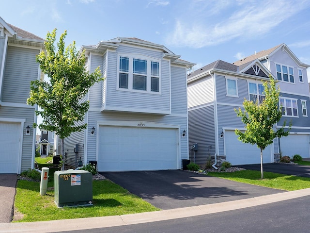 8055 Arrowwood Ln N, Maple Grove, MN 55369 - view of front of house featuring a garage and driveway