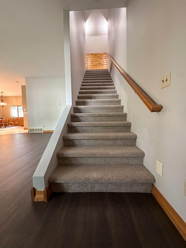 405 Fir Ave, Frazee, MN 56544 - stairs with wood finished floors and baseboards