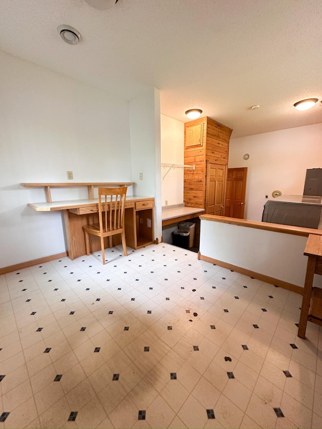 405 Fir Ave, Frazee, MN 56544 - kitchen with built in study area and baseboards