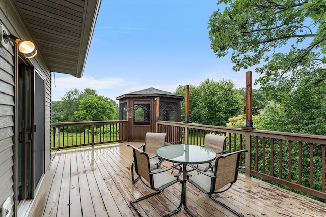 26943 140th St NW, Zimmerman, MN 55398 - wooden terrace featuring outdoor dining space