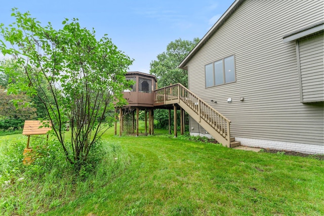 26943 140th St NW, Zimmerman, MN 55398 - view of green lawn with stairs and a deck