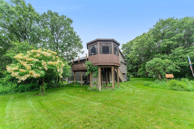 26943 140th St NW, Zimmerman, MN 55398 - view of grassy yard featuring a deck and stairway